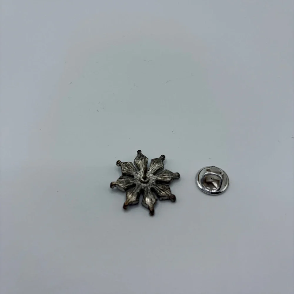 Vintage Snowflake Pin Iridescent AB Rhinestone Starburst Gunmetal Lapel Brooch
